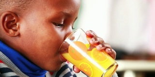 Little boy eating breakfast