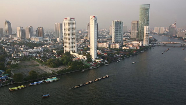 View from hi-rise deck across city skyline, Chao Phraya River