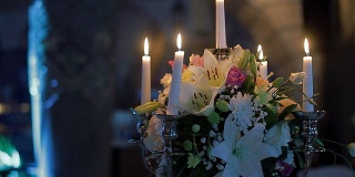 Table decoration with candles and flowers