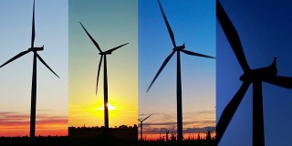 四个风力涡轮机在日落