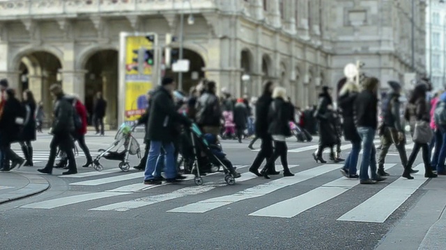 people crossing street.