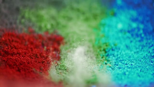 SLO MO彩色颜料通过振动升到空气中