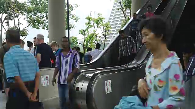 Time-lapse crowded people in shopping mall at singapore