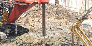 Caterpillar machine dig hole for piling