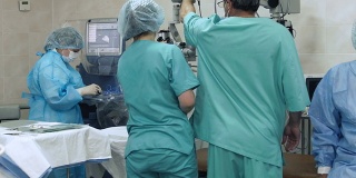 Surgical team prepare to do the operation