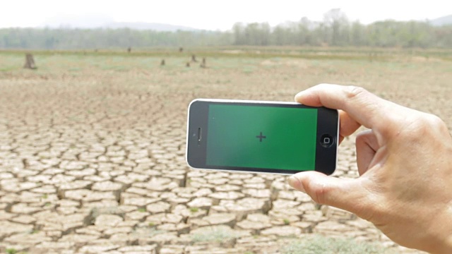 Green screen phone, arid climate.