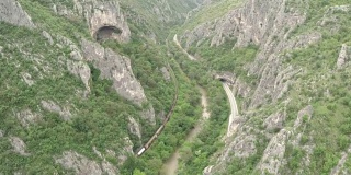 Train Passing Through The Canyon Tunnel
