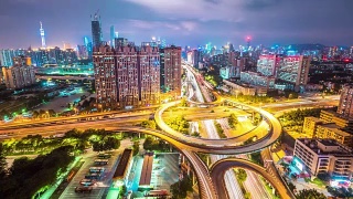 夜间广州市中心十字路口的交通繁忙视频素材模板下载