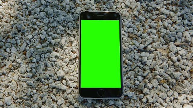 智能手机手机白石太阳反射色绿屏幕