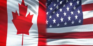 加拿大和美国旗帜的背景，外交和经济关系