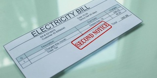 电费单第二次通知，在单据上加盖手印，付款，价目表