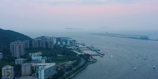 日落天空海南岛著名的三亚凤凰酒店航拍全景4k中国