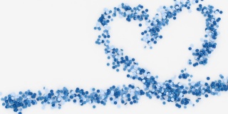 许多蓝色的药片形成一个心的形状
