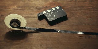 视频胶片拍板木桌高清镜头