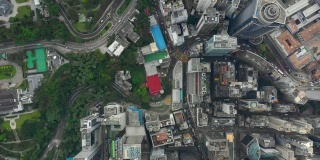 阳光明媚的香港市区交通路口高空高空俯视图4k