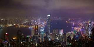 夜晚照亮香港城市景观山顶视角全景4k时间推移