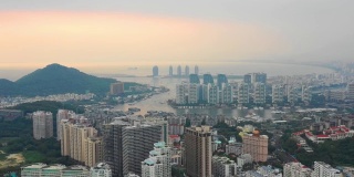 日落时分三亚港著名的大东海城市景观航拍全景4k中国海南