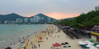 日落天空三亚市风景著名的大东海海滩航拍全景4k中国海南