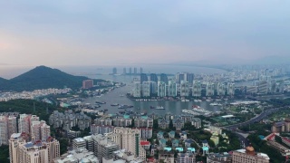 傍晚日落时间三亚市风景海湾航空全景4k中国海南视频素材模板下载