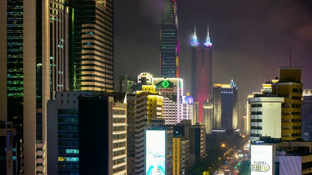 夜晚照亮深圳城市景观交通街道市中心屋顶全景4k时间推移中国