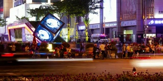 深圳城市夜晚灯火辉煌著名的交通十字路口拥挤的人行横道全景4k时间的中国