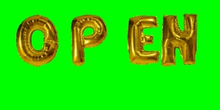 绿色屏幕上漂浮着氦气金气球上的字母