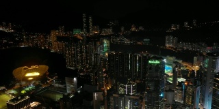 夜景照亮香港市区，海湾航拍4k