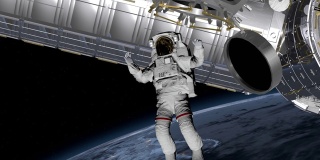 宇航员太空行走，在空地上挥手。国际空间站围绕地球大气层旋转。这段视频由美国宇航局提供。