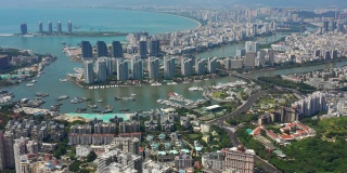阳光明媚的三亚著名的大东海城市景观岛航拍全景4k海南中国