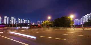 夜晚的时间照亮了三亚交通街道公寓综合体全景4k海南岛中国