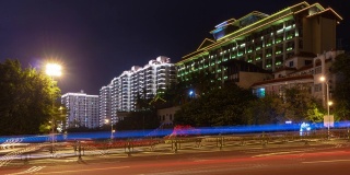 夜间灯光照亮三亚交通街道酒店全景4k海南岛中国