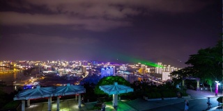 夜晚的时间照亮了三亚著名的公园顶端的城市景观全景4k时间的中国海南岛