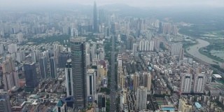 白天飞行在深圳城市景观高空中全景4k中国