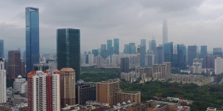 白天飞行在深圳城市景观市中心空中全景4k中国