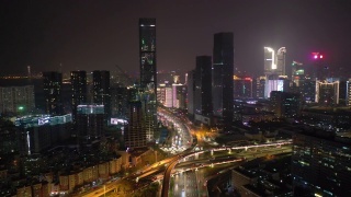夜间照明飞行在深圳市区交通街道空中全景4k中国视频素材模板下载