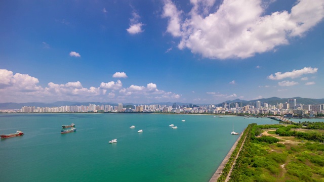 三亚市湾阳光日著名的酒店度假屋顶全景4k时间推移海南岛中国