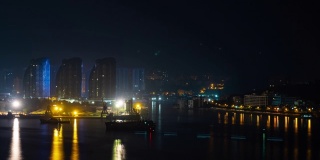 夜晚的时间照亮了三亚工业湾全景4k海南岛中国