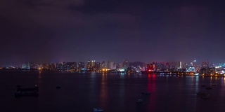 夜晚时间照亮三亚市海湾酒店屋顶全景4k时间推移海南岛中国