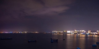夜晚时间照亮三亚市海湾酒店屋顶全景4k时间推移海南岛中国