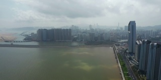 阳光明媚的日子，珠海城著名的澳门湾全景鸟瞰图4k中国