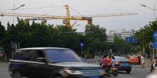 三亚城市晚上时间交通街道施工起重机全景4k中国海南