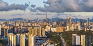 T/L MS HA ZI Shenzhen skyline with moving clouds/深圳，中国