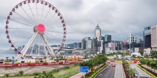 4K时间推移的摩天轮，以香港中区城市景观为背景