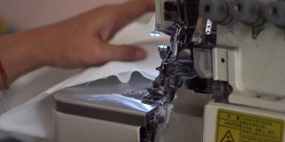 专业裁缝服装设计师用缝纫机缝制衣服