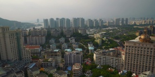日落时间晴天三亚城市景观酒店屋顶全景4k海南中国