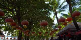 阳光明媚的三亚市大东海海滩慢镜头咖啡厅装修全景4k海南中国