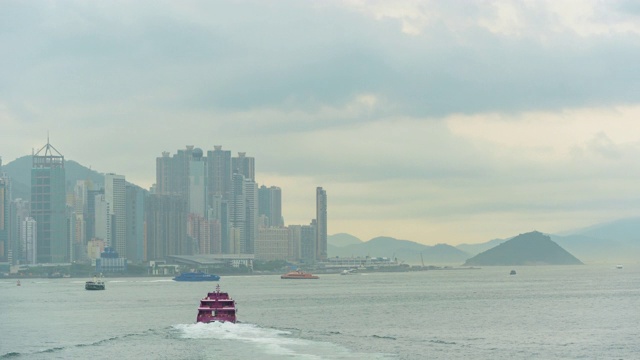 时光流逝的香港城市在上午与建筑现代城市商务区