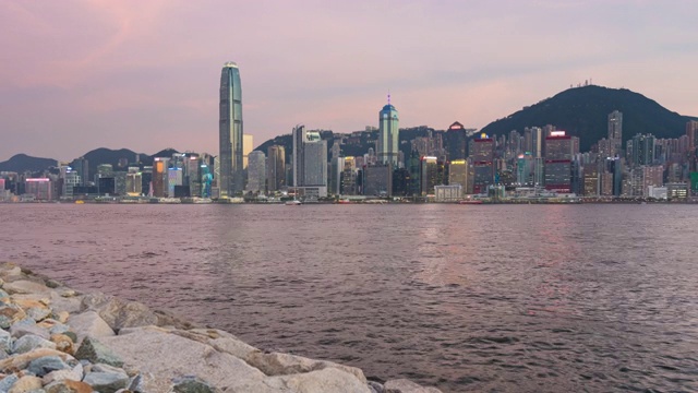 时间流逝:香港城市从早到晚摩天楼建筑-现代城市，亚洲中心商务区