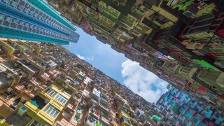 香港鱼涌益发大厦时间图。旧公寓的住宅区。高层建筑，摩天大楼与窗户的建筑在城市的中午城市。视频素材模板下载