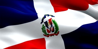 多米尼加共和国的旗帜在风中飘扬。现实的多米尼加共和国国旗背景。多米尼加共和国旗帜循环特写1080p全高清1920X1080镜头。多米尼加共和国南美国家国旗镜头视频电影，新闻